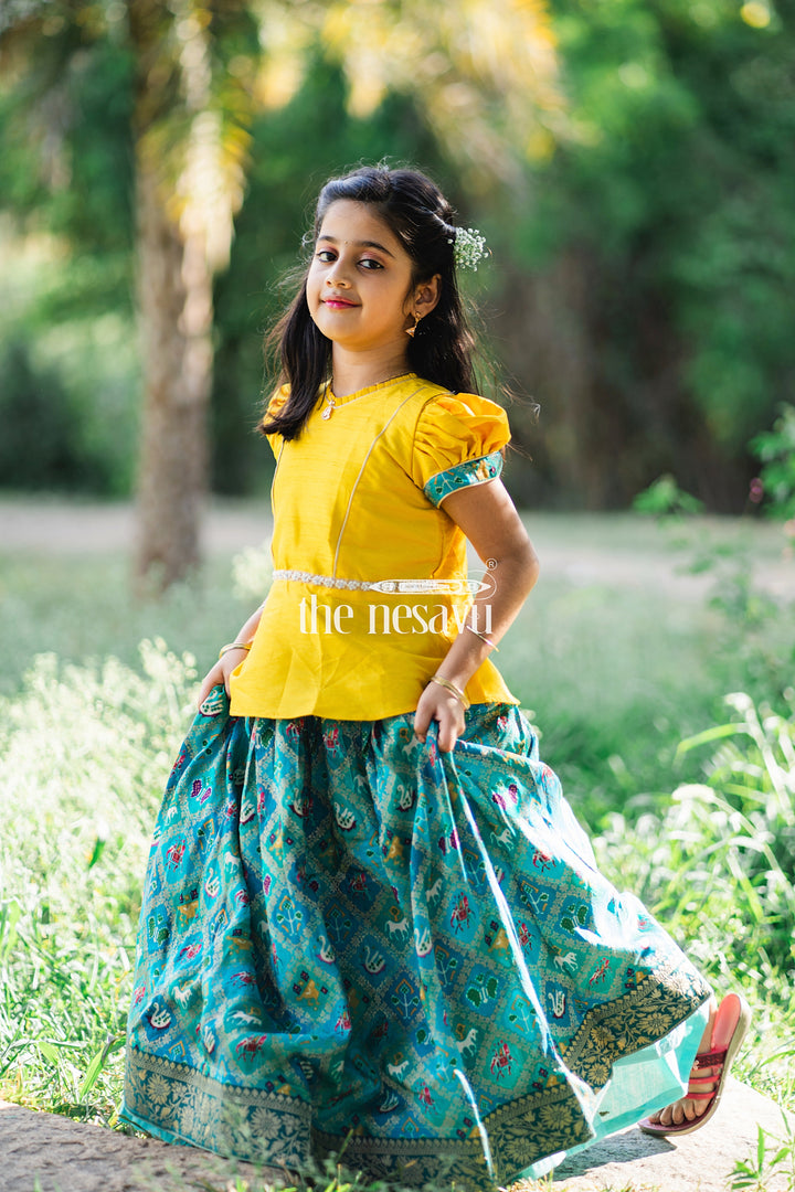 The Nesavu Pattu Pavadai Vibrant Yellow and Teal Girls Pattu Pavadai Handcrafted Silk Skirt Blouse Set Nesavu Vibrant Yellow and Teal Girls Pattu Pavadai | Handcrafted Silk Skirt Blouse Set | The Nesavu