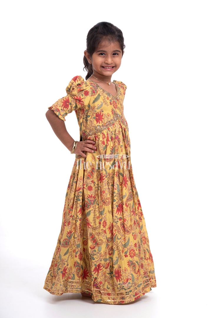 The Nesavu Girls Party Gown Vibrant Yellow Floral Muslin Silk Party Gown for Girls Nesavu Vibrant Yellow Floral Muslin Silk Party Gown for Girls - Elegant & Festive