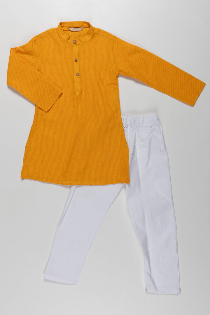 The Nesavu Boys Kurtha Set Vibrant Yellow Kurta with White Pajama Set for Kids - Traditional Festive Wear Nesavu 14 (6M) / Yellow BES49-14 Vibrant Yellow Kurta with White Pajama Set for Kids | Traditional Festive Wear | The Nesavu