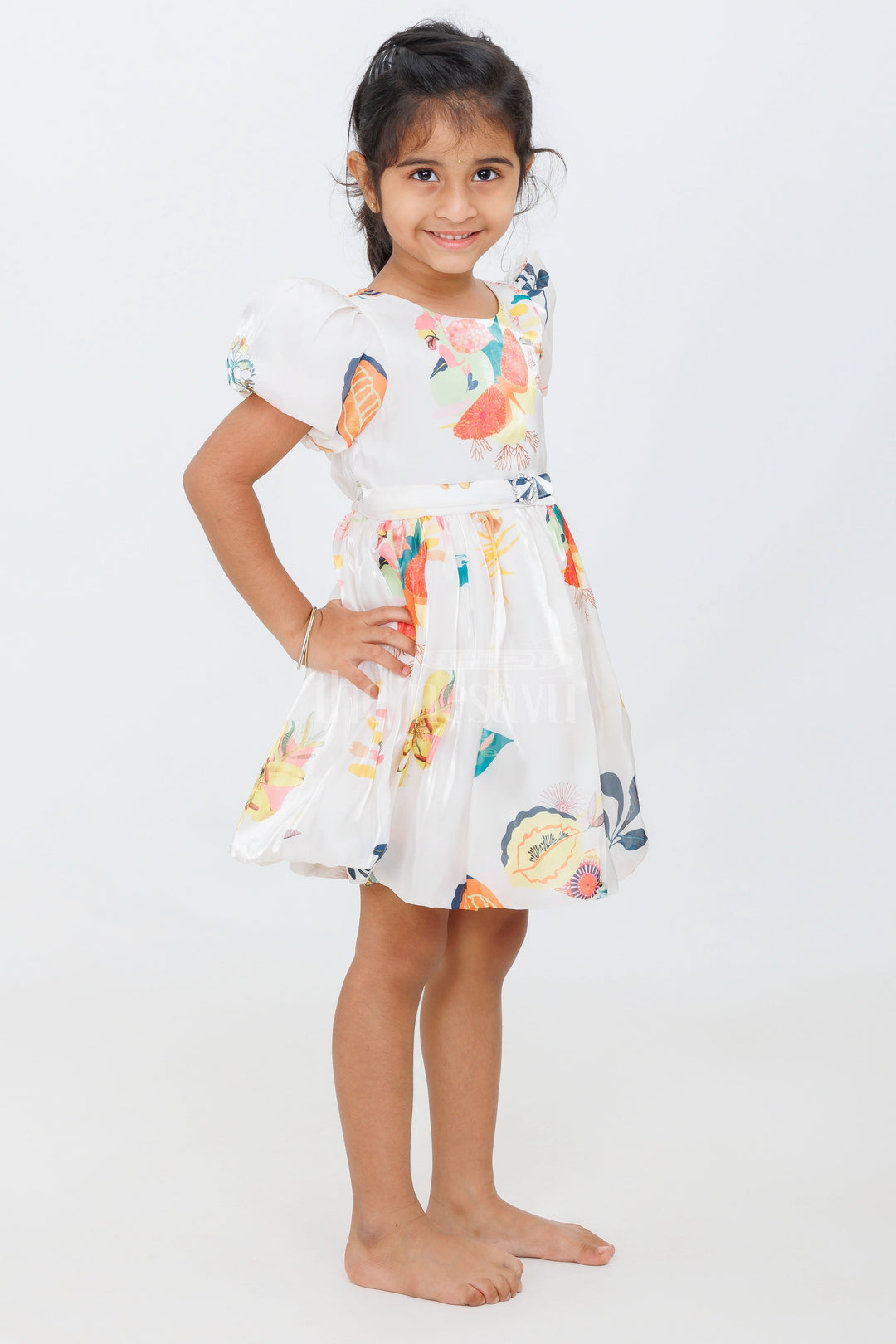 The Nesavu Girls Fancy Frock White Girls Fancy Party Gown with Floral Print and Puff Sleeves for Teenagers Nesavu Nesavu White Girls Floral Party Gown Puff Sleeves Belted Waist Teens