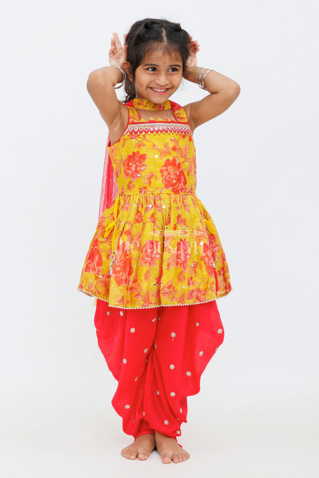 The Nesavu Girls Dothi Sets Yellow Chinon Silk Printed Peplum Top and Dhoti Set for Girls with Sequin and Mirror Detailing Nesavu Yellow Chinon Silk Printed Peplum Top and Dhoti Set for Girls with Sequin and Mirror Detailing Nesavu