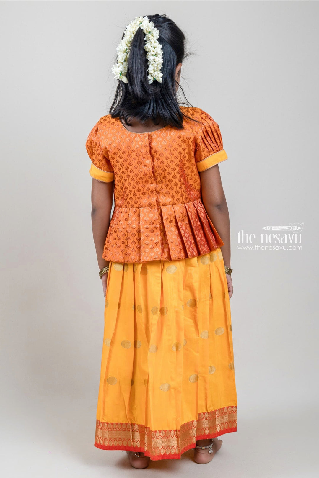 The Nesavu Pattu Pavadai Zari Floral Designer Yellow Silk Peplum Blouse N Knife Pleated Yellow Silk Skirt With Small Border for Girls Nesavu Ethnic Zari Floral Designer Yellow Silk Peplum Blouse with Knife Pleated Yellow Silk Skirt for Girls | Shop at The Nesavu